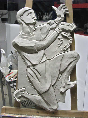 St Patrick sculpture (Captive) early progress in clay